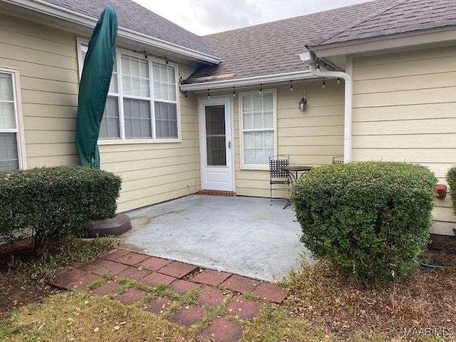 entrance to property with a patio area