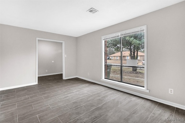 unfurnished room featuring wood-type flooring