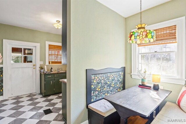 dining space featuring sink