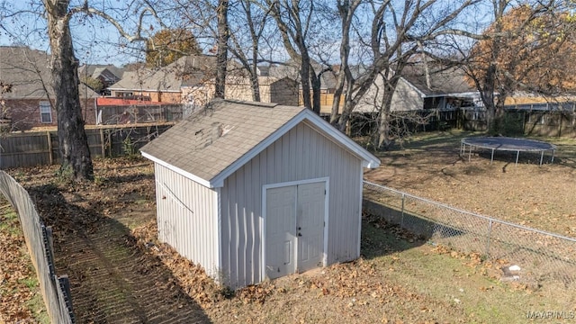 view of outbuilding with a trampoline