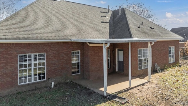 back of property featuring a patio area