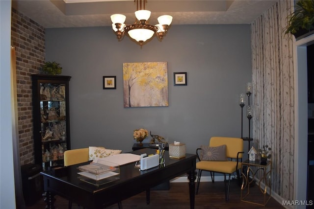 office area with hardwood / wood-style flooring and a chandelier