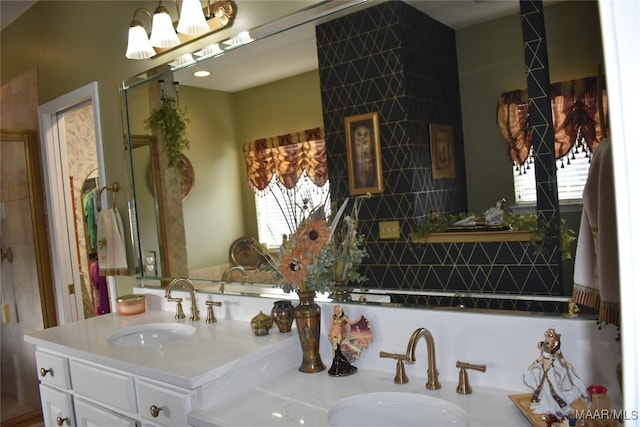 bathroom with vanity and a wealth of natural light