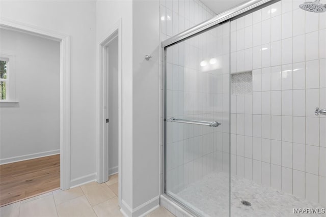 2065 Robinson Pond Rd, Prattville, AL 36067 - full bathroom featuring baseboards, tile patterned floors, and tiled shower