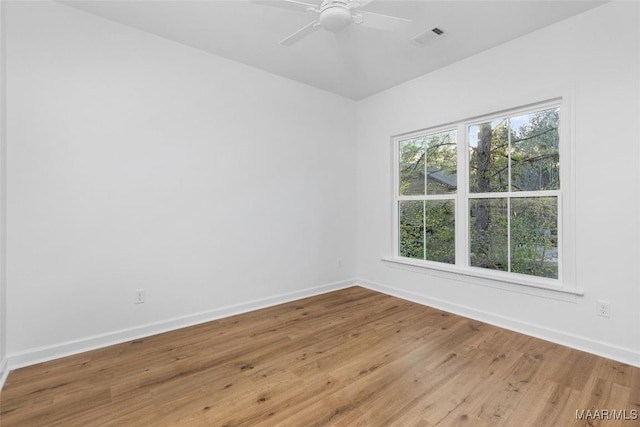 2065 Robinson Pond Rd, Prattville, AL 36067 - unfurnished room with baseboards, wood finished floors, visible vents, and a ceiling fan