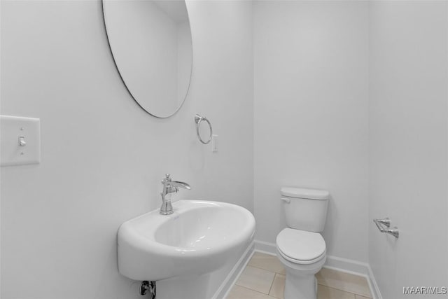 2065 Robinson Pond Rd, Prattville, AL 36067 - half bath with toilet, tile patterned floors, a sink, and baseboards