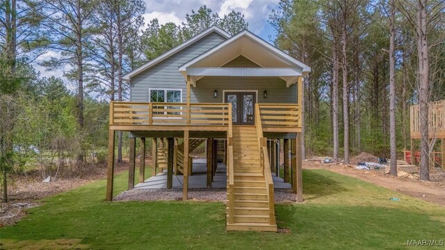 2065 Robinson Pond Rd, Prattville, AL 36067 - view of playground featuring a wooden deck, a yard, stairs, and french doors
