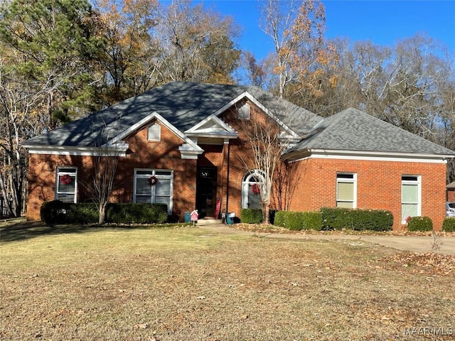 view of front property with a front lawn