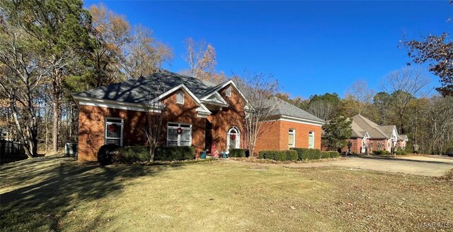 view of front property with a front lawn