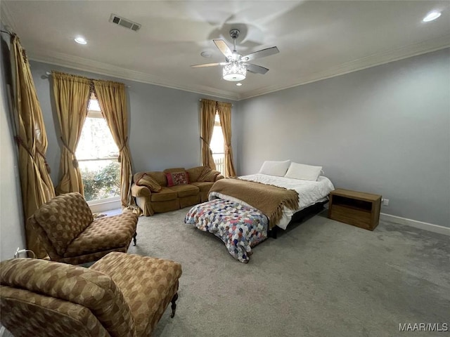 bedroom featuring carpet, ceiling fan, and crown molding