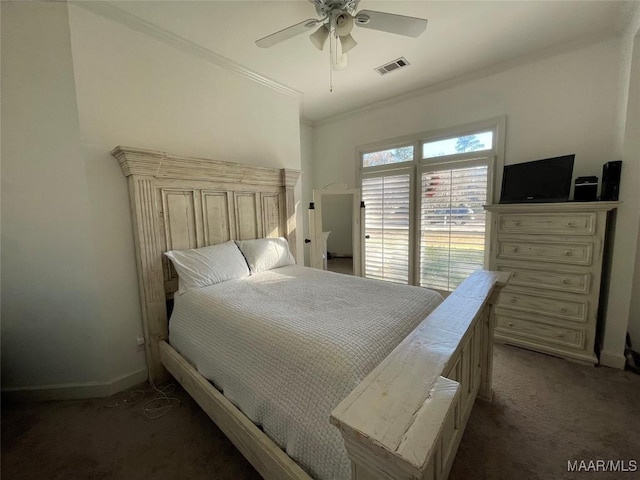 carpeted bedroom featuring ceiling fan and ornamental molding