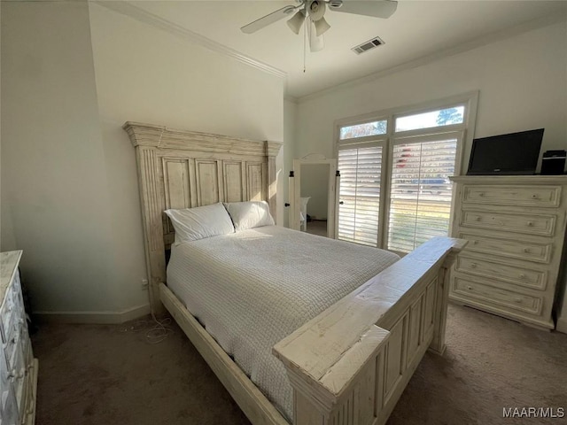 bedroom with dark colored carpet, ceiling fan, and crown molding