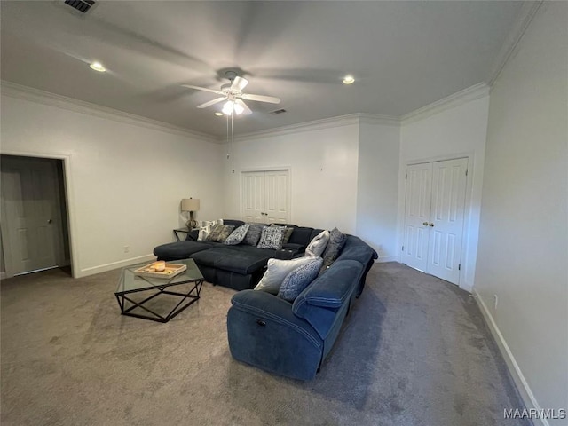 living room with carpet, ceiling fan, and ornamental molding