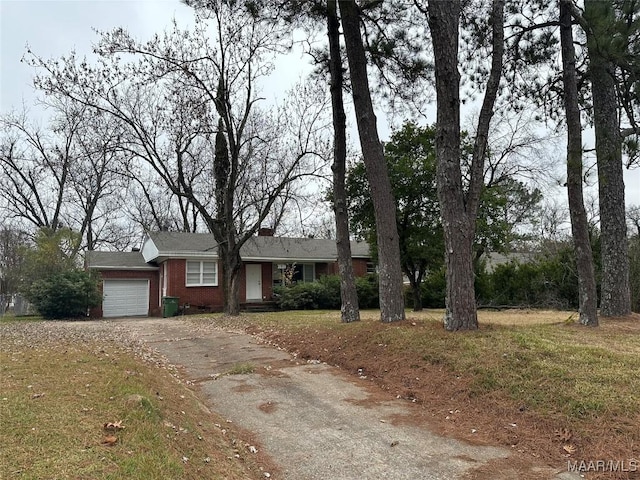 ranch-style home featuring a garage