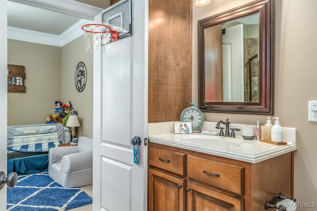 bathroom featuring vanity and ornamental molding