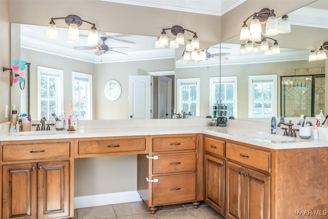 bathroom featuring ceiling fan, tile patterned flooring, and a healthy amount of sunlight