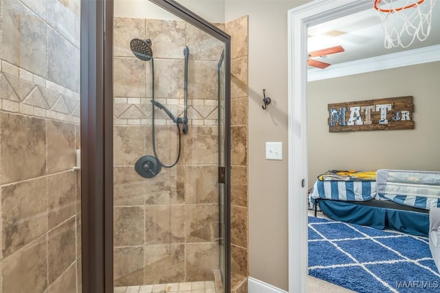 bathroom featuring a shower with door and ornamental molding