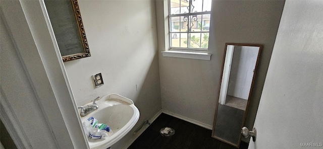 bathroom with plenty of natural light and sink