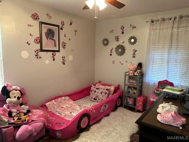 bedroom featuring carpet flooring and ceiling fan