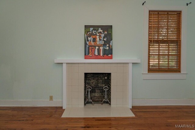 1220 Westmoreland Ave, Montgomery, AL 36106 - detailed view of wood finished floors and a fireplace