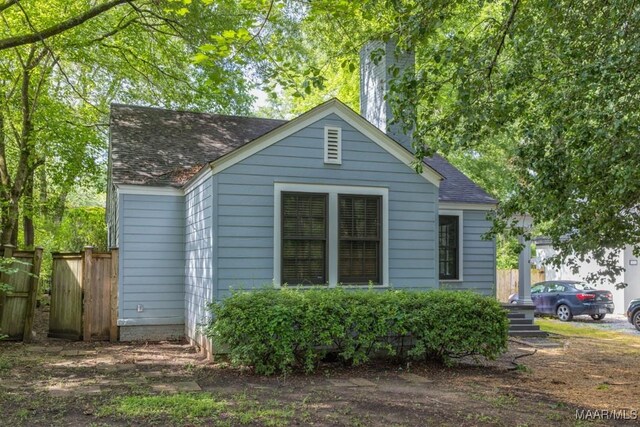 1220 Westmoreland Ave, Montgomery, AL 36106 - view of side of property featuring roof with shingles