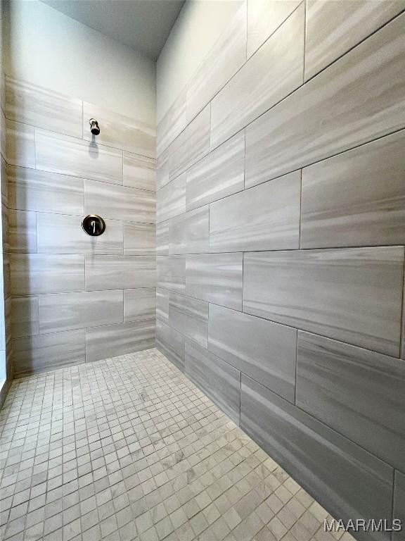 6 Village Knl, Wetumpka, AL 36093 - bathroom featuring a tile shower and tile patterned flooring