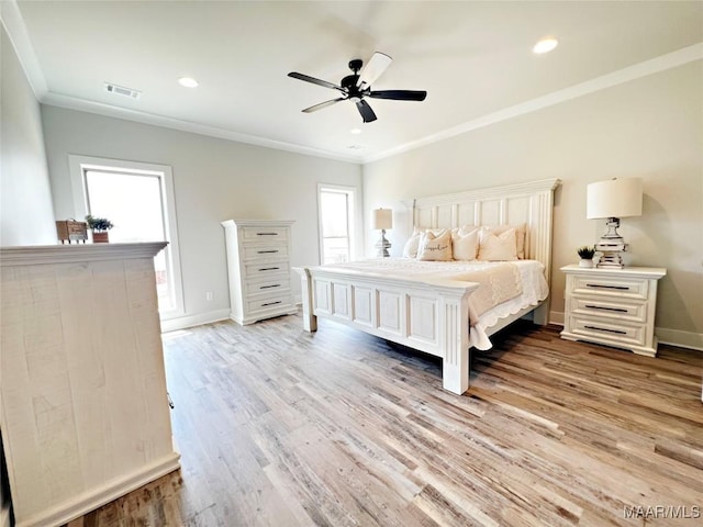 6 Village Knl, Wetumpka, AL 36093 - bedroom with light wood finished floors, baseboards, visible vents, and crown molding