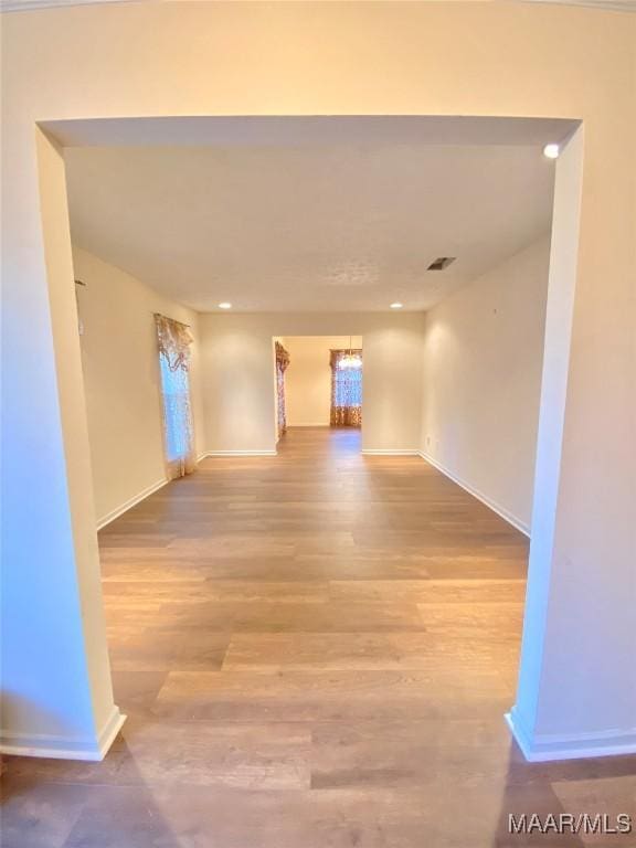 empty room featuring hardwood / wood-style flooring