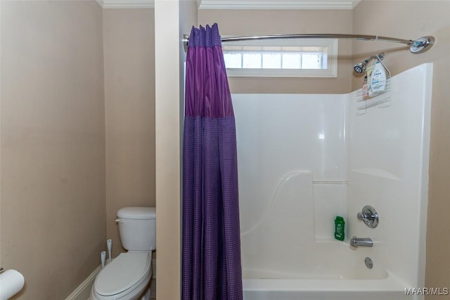 bathroom with crown molding, shower / bathtub combination with curtain, and toilet