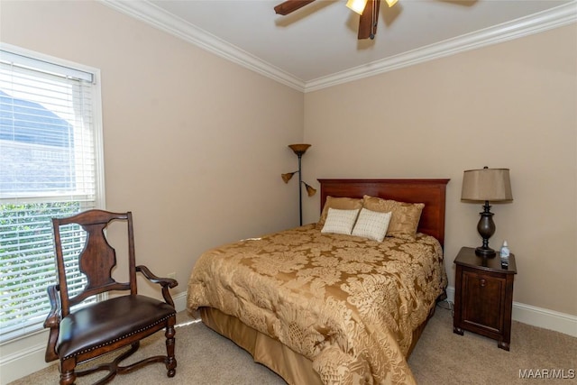 bedroom featuring ceiling fan, light colored carpet, and ornamental molding