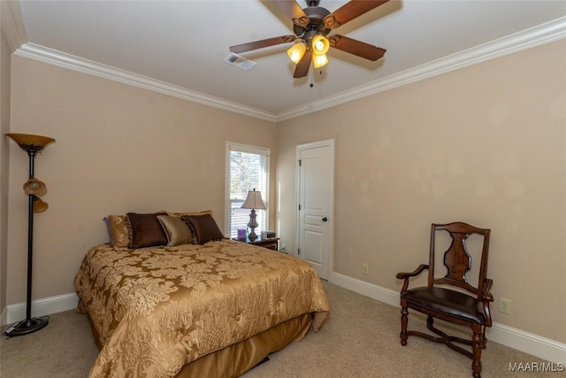 carpeted bedroom featuring ceiling fan and ornamental molding