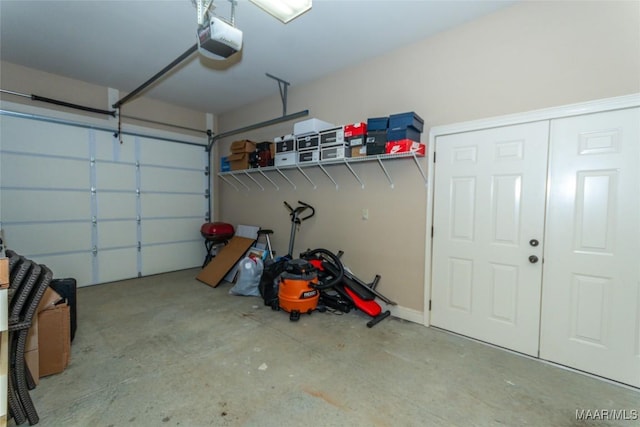 garage featuring a garage door opener