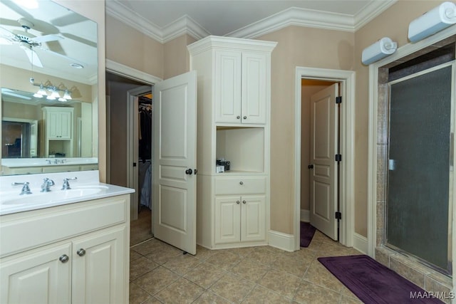 bathroom featuring tile patterned flooring, vanity, walk in shower, and crown molding