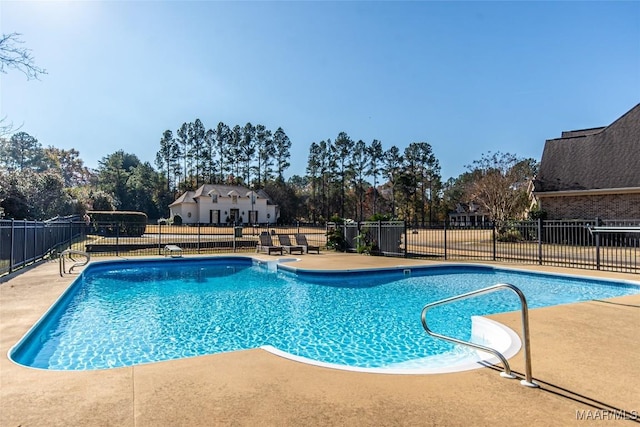 view of pool featuring a patio area