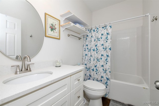 full bathroom featuring shower / bath combination with curtain, toilet, and vanity