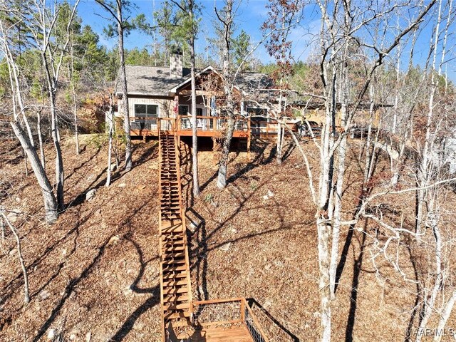 rear view of house with a deck