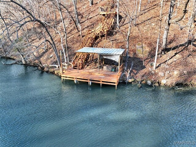 dock area featuring a water view