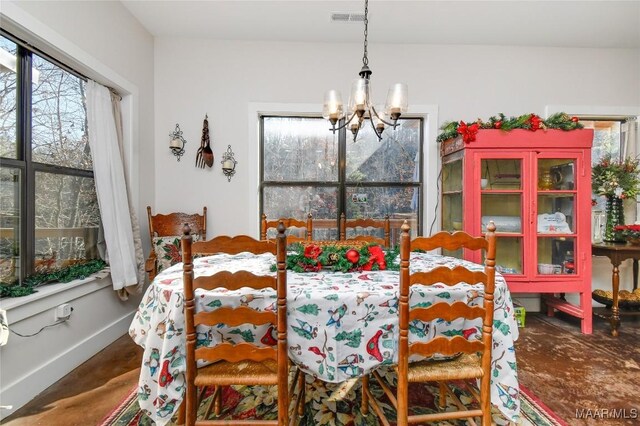 dining area with a chandelier