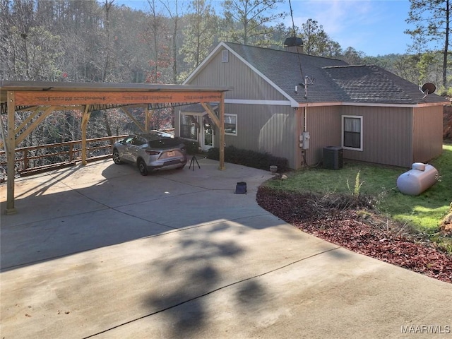 exterior space with a carport