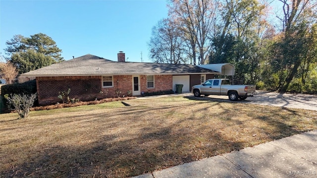 exterior space featuring a front yard and a garage