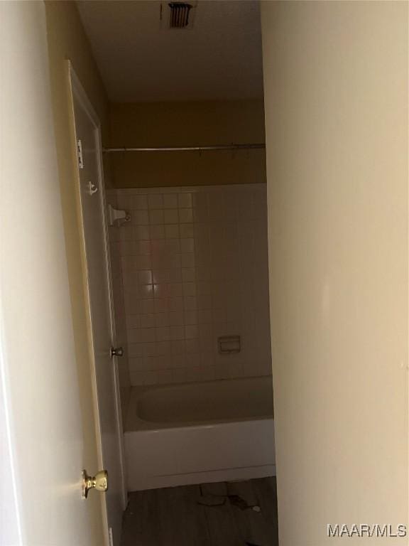 bathroom with shower / bathing tub combination