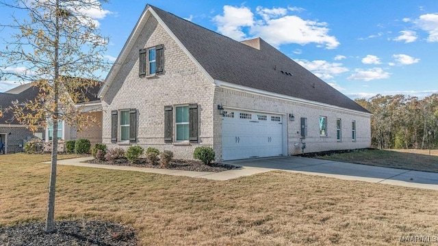 view of property exterior featuring a yard and a garage