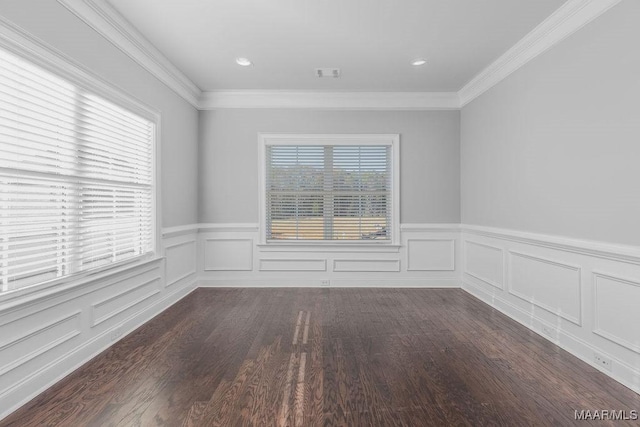 unfurnished room featuring dark hardwood / wood-style flooring and crown molding