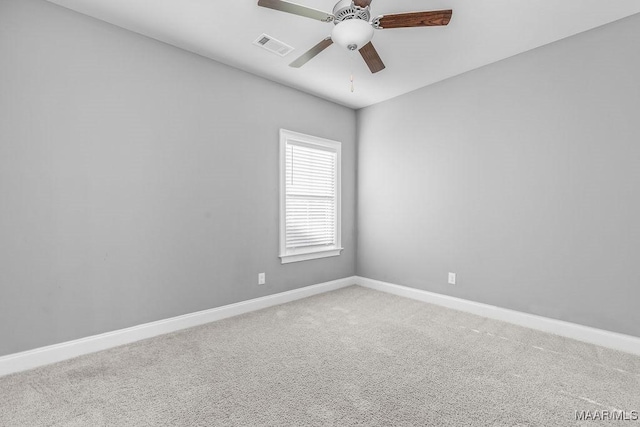 unfurnished room featuring carpet and ceiling fan