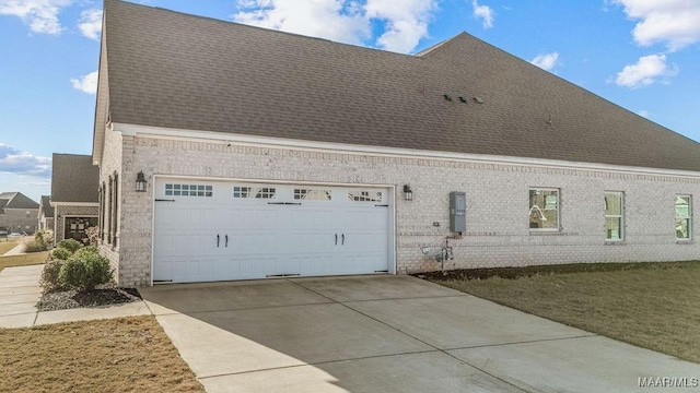 view of home's exterior with a garage