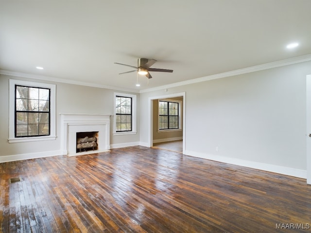 unfurnished living room featuring dark hardwood / wood-style flooring, ceiling fan, and ornamental molding