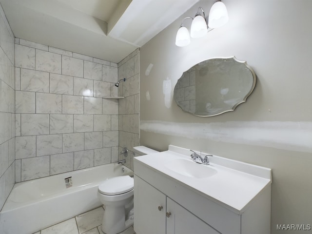 full bathroom with tile patterned flooring, toilet, vanity, and tiled shower / bath