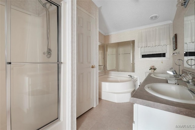 bathroom featuring vanity, independent shower and bath, a textured ceiling, and ornamental molding