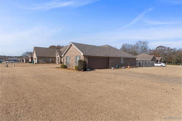 view of side of property with a garage