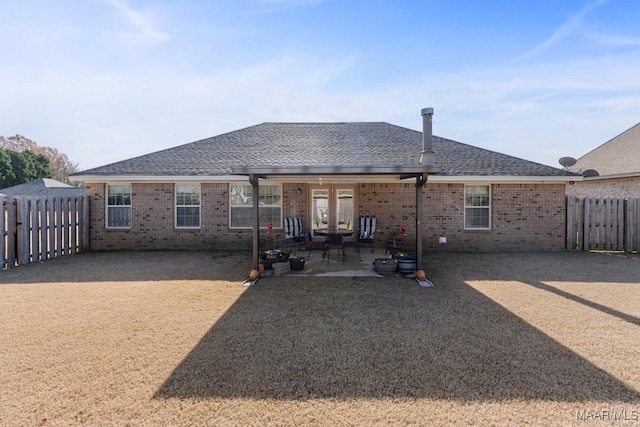 back of property featuring a patio